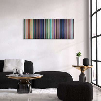 Rio color palette canvas above a black sofa with a gold-topped table
