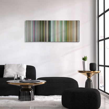 Pain & Gain color palette canvas above a black sofa with a gold-topped table