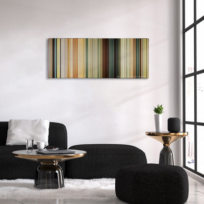 The Impossible color palette canvas above a black sofa with a gold-topped table