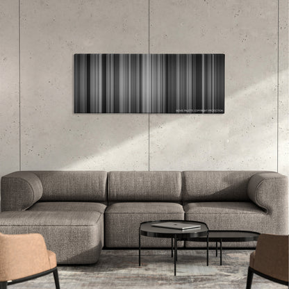 Role Models color palette canvas on a concrete wall above a gray sectional sofa