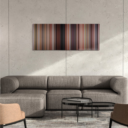 Clueless color palette canvas on a concrete wall above a gray sectional sofa