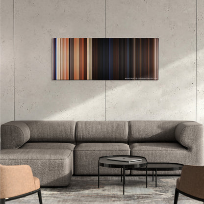 Army of Darkness color palette canvas on a concrete wall above a gray sectional sofa