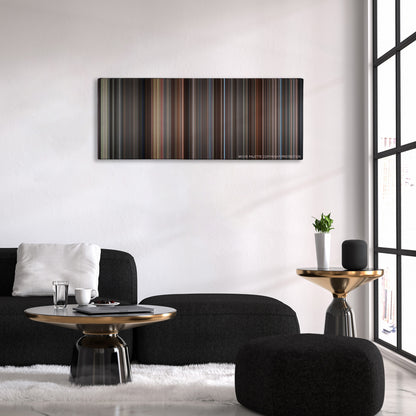 Hidden Figures color palette canvas above a black sofa with a gold-topped table