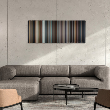 Lion color palette canvas on a concrete wall above a gray sectional sofa