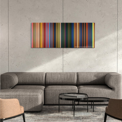 The Princess and the Frog color palette canvas on a concrete wall above a gray sectional sofa