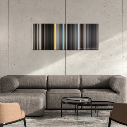 Iron Man color palette canvas on a concrete wall above a gray sectional sofa