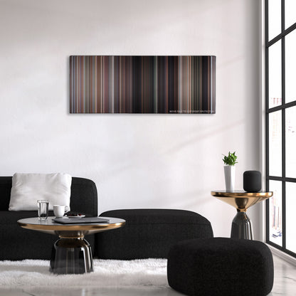 Commando color palette canvas above a black sofa with a gold-topped table
