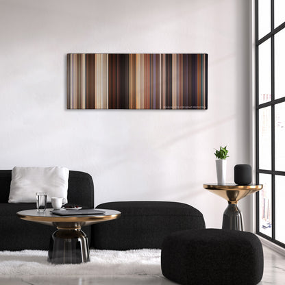 American Reunion color palette canvas above a black sofa with a gold-topped table