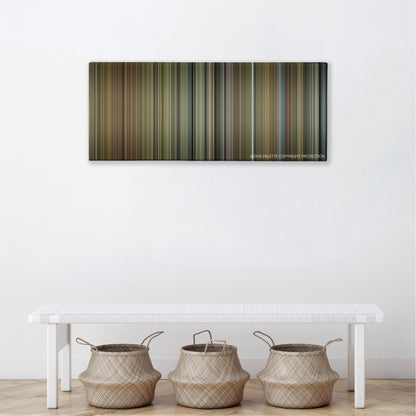 The Elephant Man color palette canvas above a white bench with three woven baskets