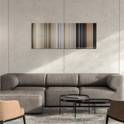 One Flew Over the Cuckoo's Nest color palette canvas on a concrete wall above a gray sectional sofa