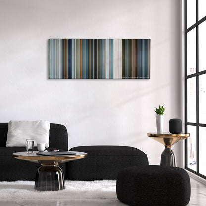 Oblivion color palette canvas above a black sofa with a gold-topped table
