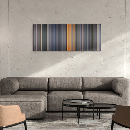 Galaxy Quest color palette canvas on a concrete wall above a gray sectional sofa