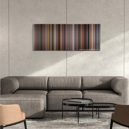 Serendipity color palette canvas on a concrete wall above a gray sectional sofa