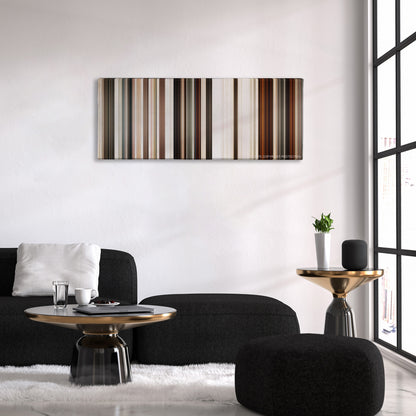 Jarhead color palette canvas above a black sofa with a gold-topped table