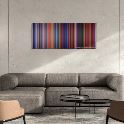 The Hunchback of Notre Dame color palette canvas on a concrete wall above a gray sectional sofa