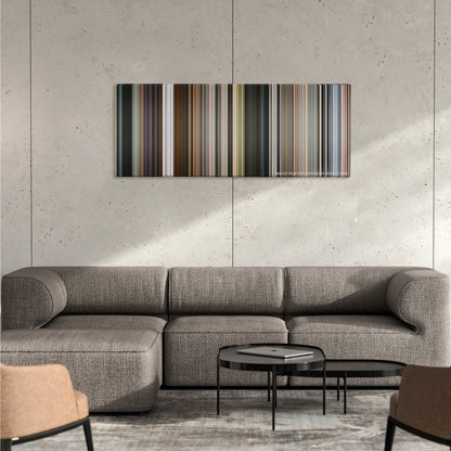 Mission: Impossible - Fallout color palette canvas on a concrete wall above a gray sectional sofa