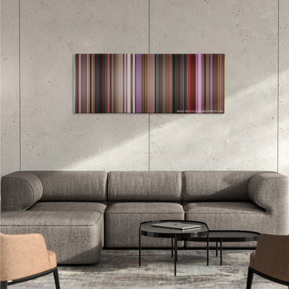 Singin' in the Rain color palette canvas on a concrete wall above a gray sectional sofa