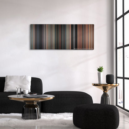 Thelma & Louise color palette canvas above a black sofa with a gold-topped table