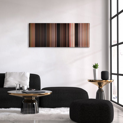 The Fast and the Furious color palette canvas above a black sofa with a gold-topped table