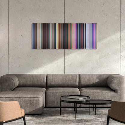 Big Hero 6 color palette canvas on a concrete wall above a gray sectional sofa