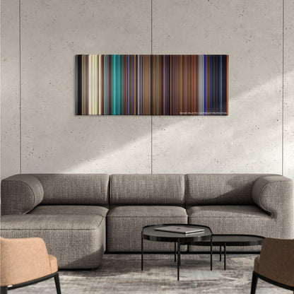 Kill Bill: Vol. 1 color palette canvas on a concrete wall above a gray sectional sofa