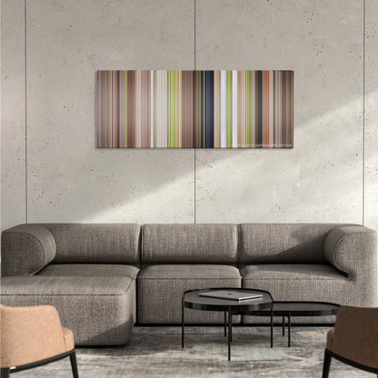 Wedding Crashers color palette canvas on a concrete wall above a gray sectional sofa