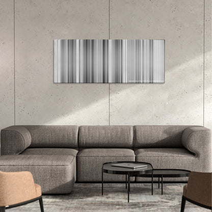 Bicycle Thieves color palette canvas on a concrete wall above a gray sectional sofa