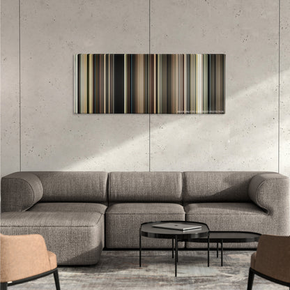 The Master color palette canvas on a concrete wall above a gray sectional sofa