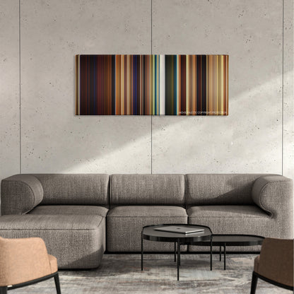Puss in Boots color palette canvas on a concrete wall above a gray sectional sofa
