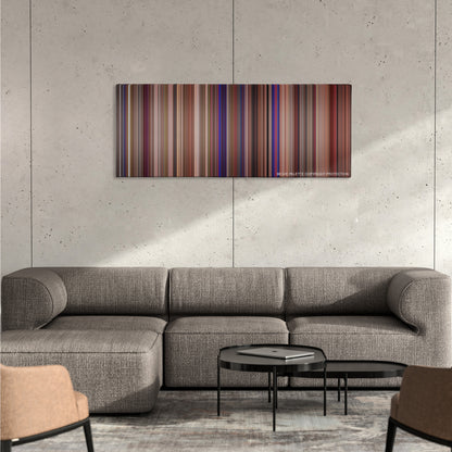 This Is Spinal Tap color palette canvas on a concrete wall above a gray sectional sofa