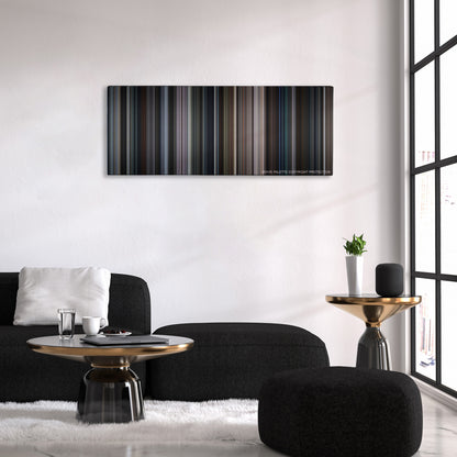 King Arthur: Legend of the Sword color palette canvas above a black sofa with a gold-topped table
