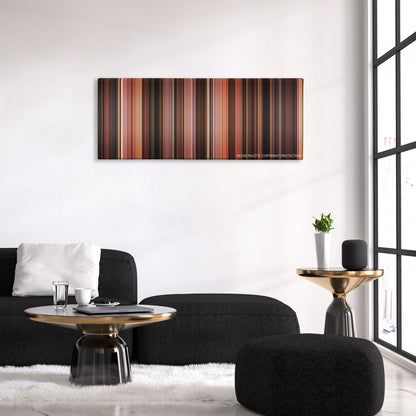 Bad Santa color palette canvas above a black sofa with a gold-topped table