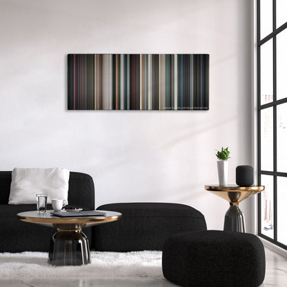 Iron Man 2 color palette canvas above a black sofa with a gold-topped table