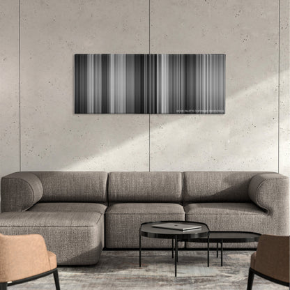 On the Waterfront color palette canvas on a concrete wall above a gray sectional sofa