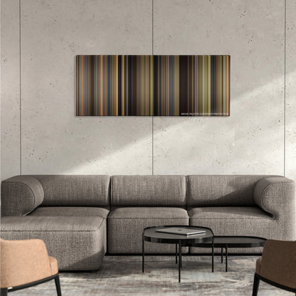 We Bought a Zoo color palette canvas on a concrete wall above a gray sectional sofa