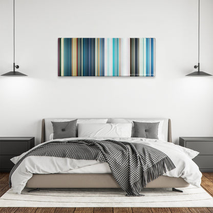 The Meg color palette canvas above a bed, between two black pendant lamps