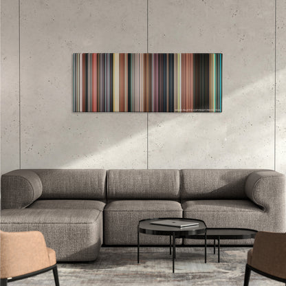 The Great Gatsby color palette canvas on a concrete wall above a gray sectional sofa