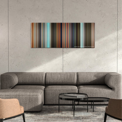 Robots color palette canvas on a concrete wall above a gray sectional sofa