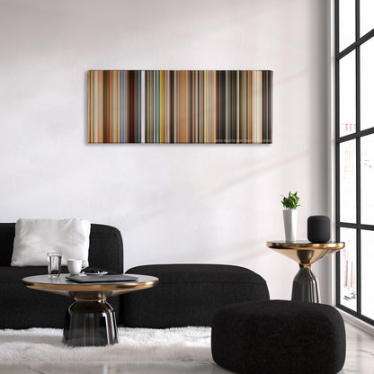 The Lovely Bones color palette canvas above a black sofa with a gold-topped table