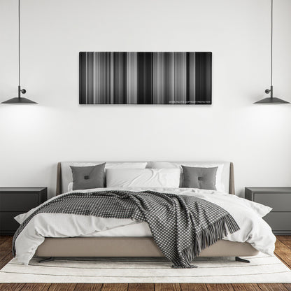 Double Indemnity color palette canvas above a bed, between two black pendant lamps