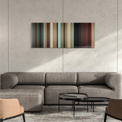 Couples Retreat color palette canvas on a concrete wall above a gray sectional sofa