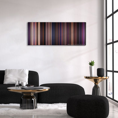 Pitch Perfect color palette canvas above a black sofa with a gold-topped table