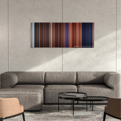 Lara Croft Tomb Raider: The Cradle of Life color palette canvas on a concrete wall above a gray sectional sofa