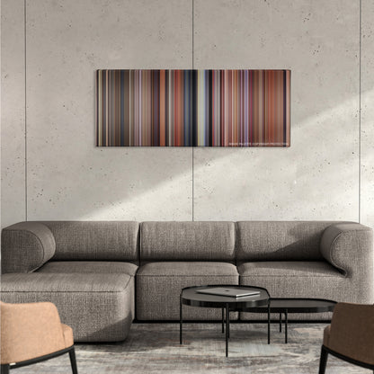 Dumb and Dumber color palette canvas on a concrete wall above a gray sectional sofa
