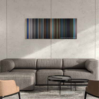 Bad Times at the El Royale color palette canvas on a concrete wall above a gray sectional sofa