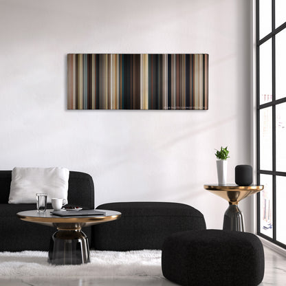 2 Guns color palette canvas above a black sofa with a gold-topped table