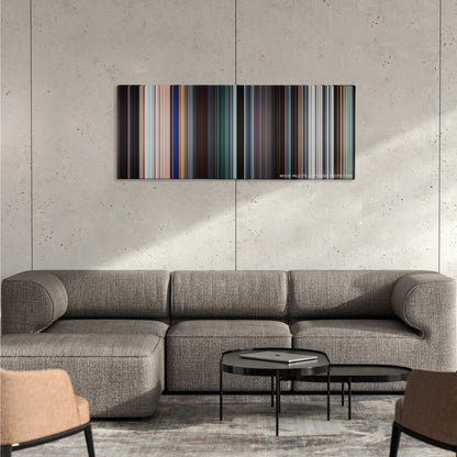 Black Panther color palette canvas on a concrete wall above a gray sectional sofa