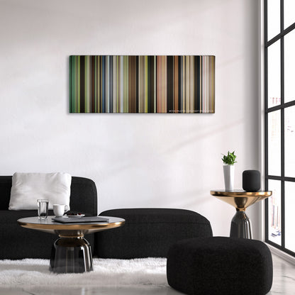 Captain Fantastic color palette canvas above a black sofa with a gold-topped table