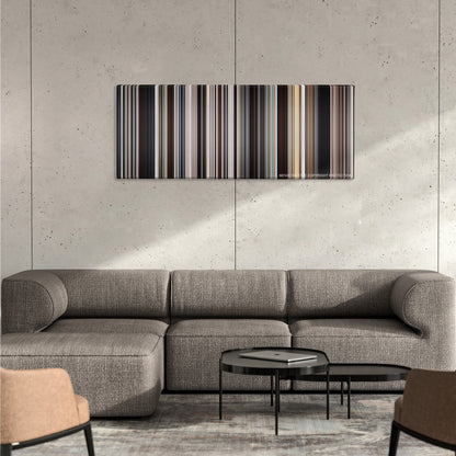There Will Be Blood color palette canvas on a concrete wall above a gray sectional sofa
