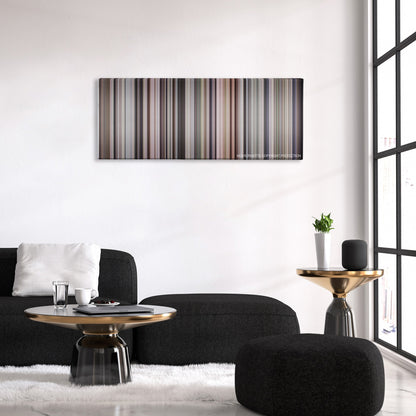 Awakenings color palette canvas above a black sofa with a gold-topped table